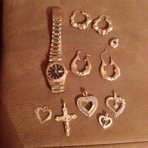 Jewelry;Seiko gold watch,two pair of gold earrings and 6 charms for any necklace